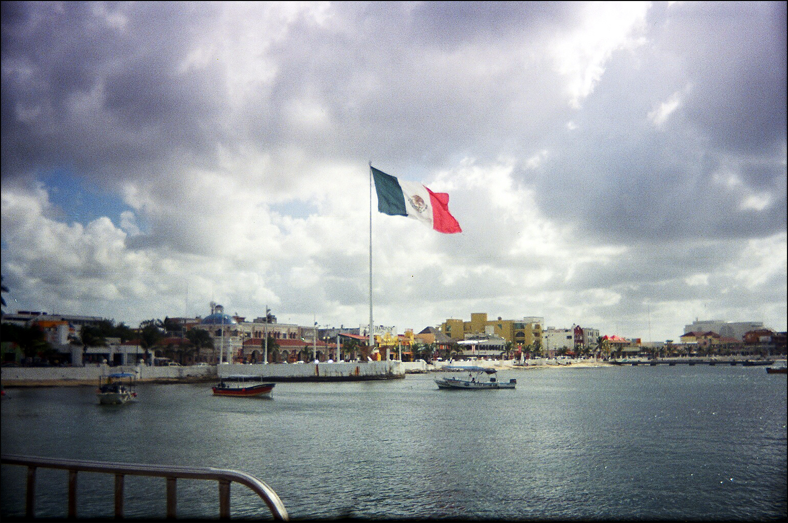 A photo of the Mexican flag near the US border