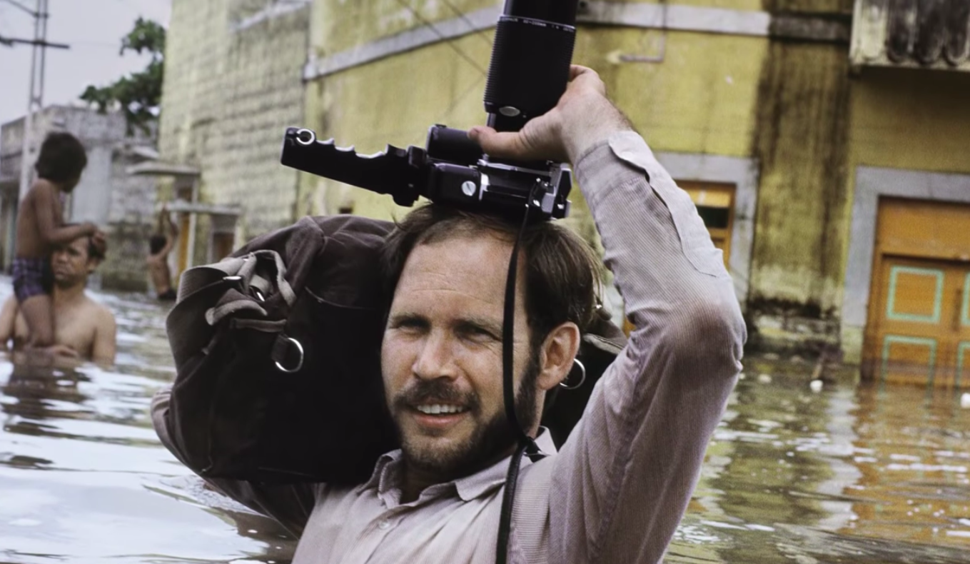 Photographer Steve McMurray amid floodwaters.